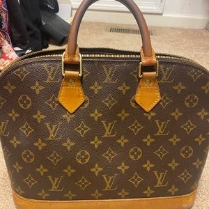 Authentic used Louis Vuitton Alma purse